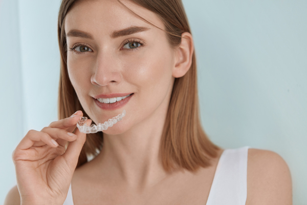 Tips For Brushing And Flossing During Invisalign Therapy